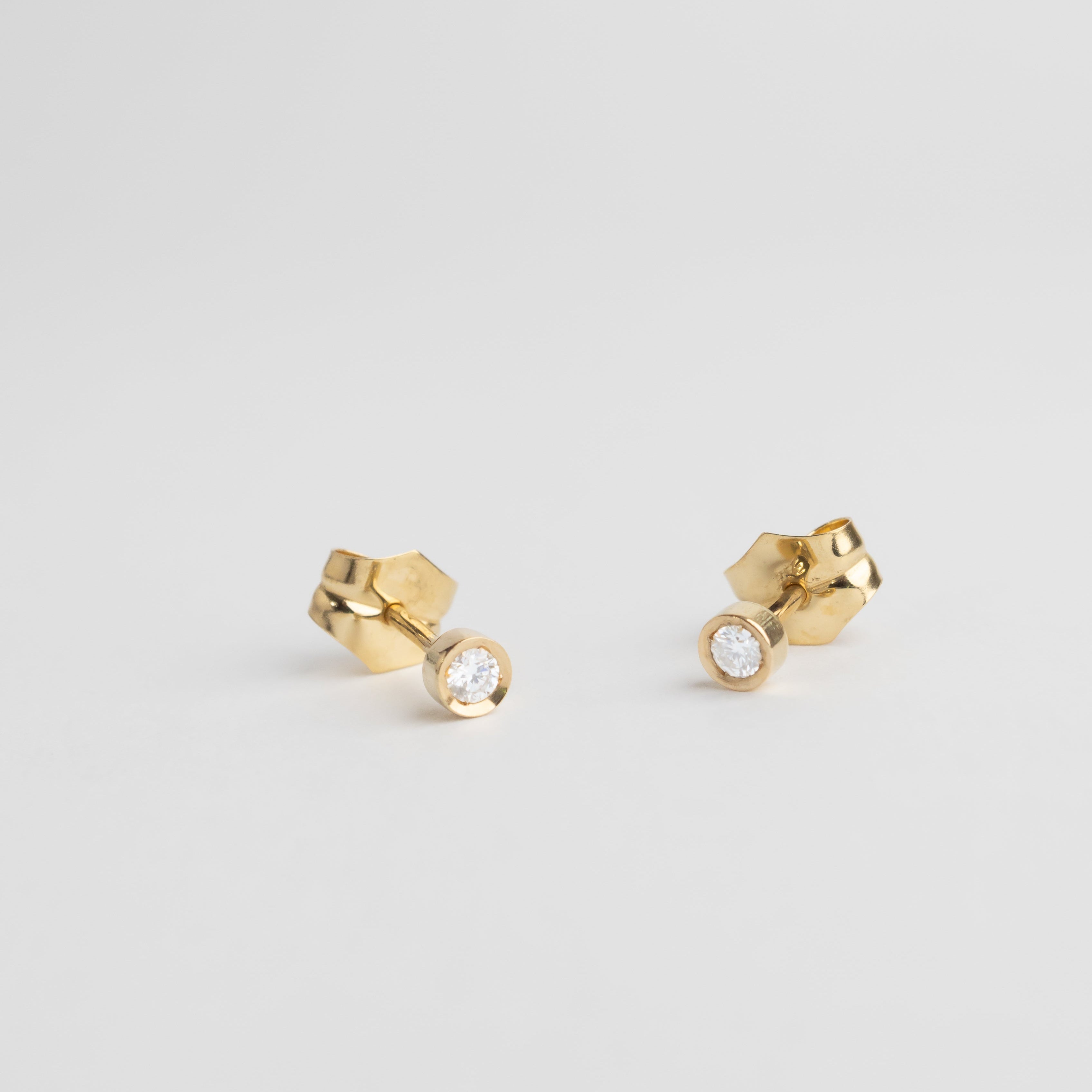 DIAMOND STUD EARRINGS