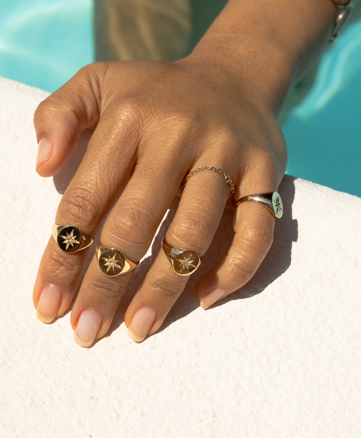 COMPASS STAR PINKY SIGNET RING