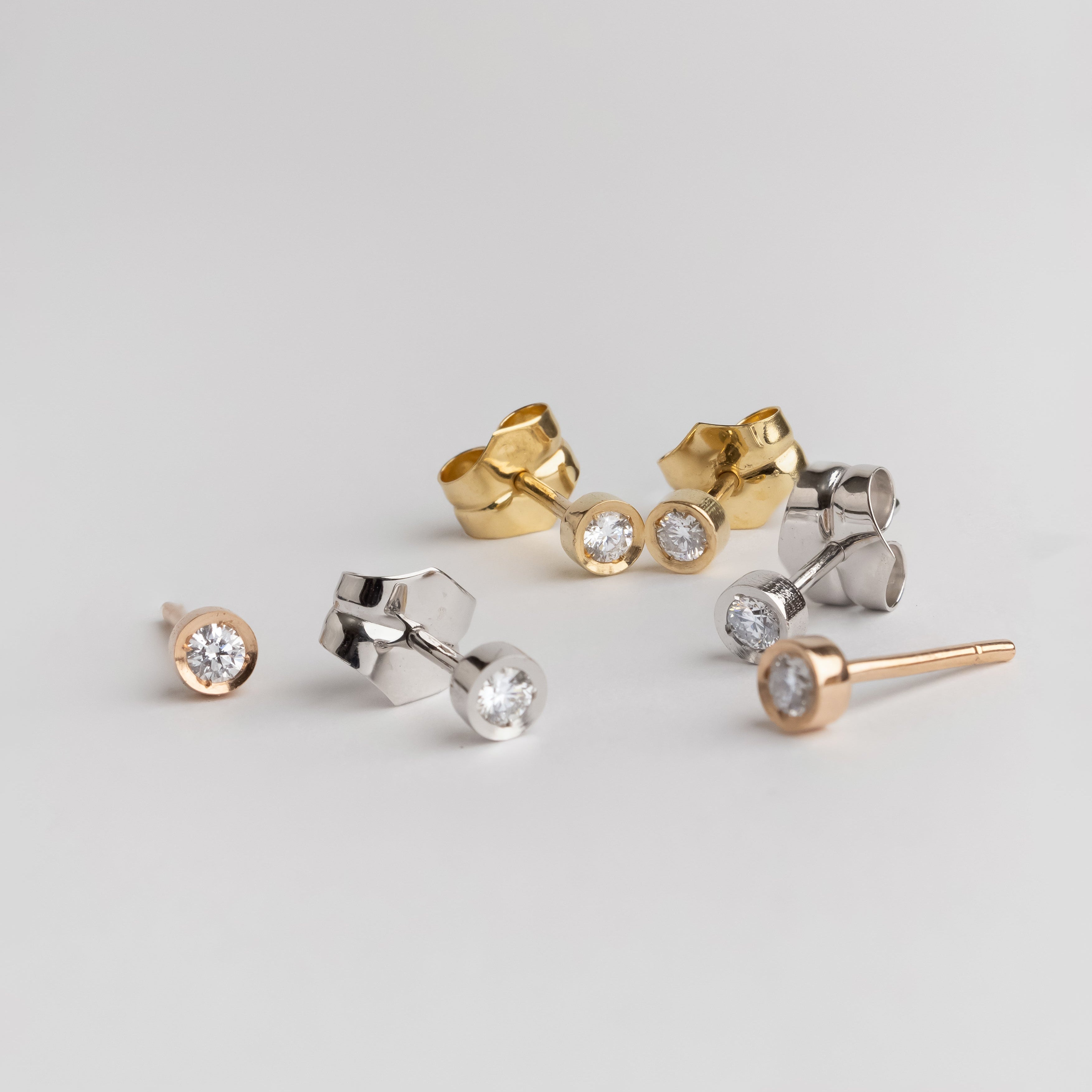 DIAMOND STUD EARRINGS